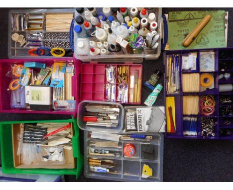 An extensive collection of model maker's tools and accessories: including various glues and adhesives, sanding boards, wet an