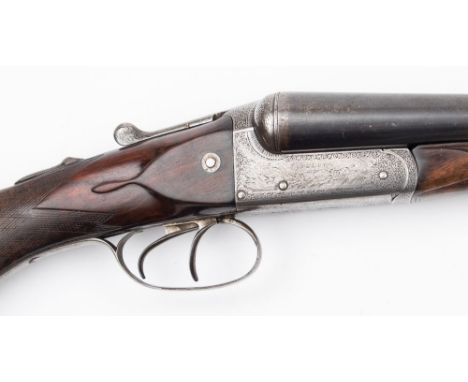 A 12 bore side by side shotgun by William Lee:, number 2124, plain 26 /14 inch barrels with  scroll engraved fences and tang,