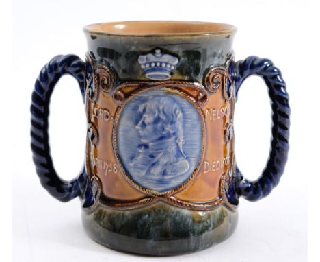 A Royal Doulton Lord Nelson commemorative twin handled mug:, with central oval portrait to one side and motto to the other, f