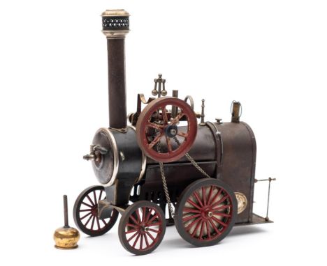 Ernst Plank for Gamage's, a live steam traction engine: of traditional design with single piston, the flywheel with drive cha