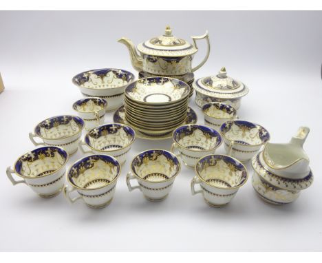 19th century tea service, gilded with crosses and scrolls on cobalt blue ground, pattern no. 232 (36) Condition Report & Furt