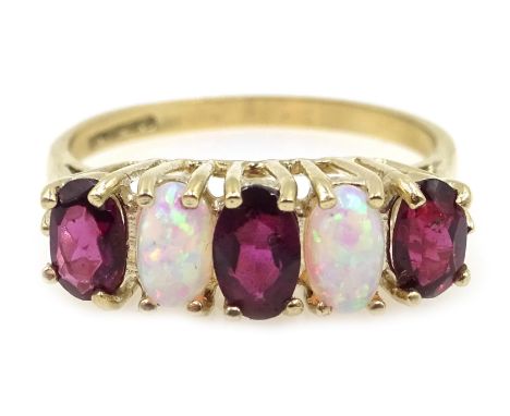 9ct gold five stone opal and garnet ring, hallmarked Condition Report & Further Details Approx 2gm, size MClick here for furt