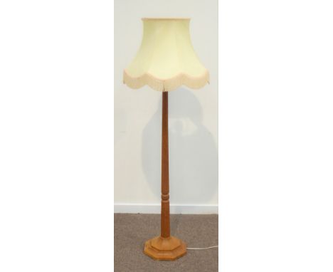 'Mouseman' oak standard lamp, adzed octagonal column on stepped octagonal base, by Robert Thompson of Kilburn, H138cm (exclud