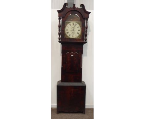 19th century Yorkshire mahogany longcase clock, shaped pediment above stepped arch glazed door with turned supports, base wit