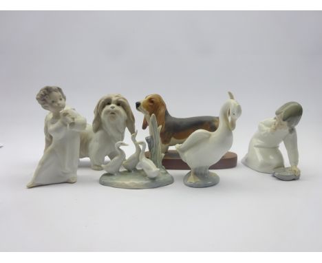 Beswick Bassett Hound on plinth, Lladro model of a Shih Tzu, two Lladro figures and two Nao Ducks (6) Condition Report & Furt