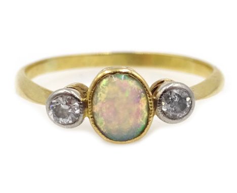 Gold three stone opal and diamond ring,  Condition Report & Further Details Approx 1.6gm, sizeClick here for further images, 