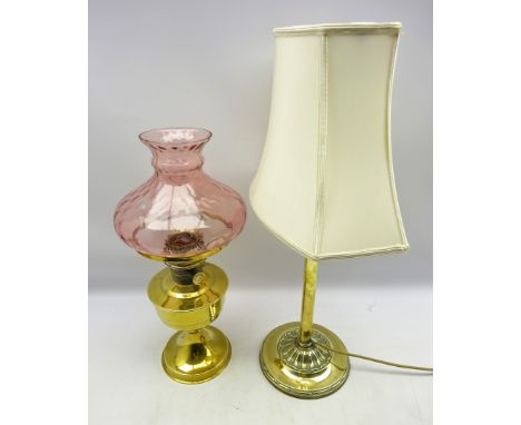 Early 20th century cast brass table lamp and shade, the cast iron base labelled Emeralite, H39cm and a brass oil lamp with pi