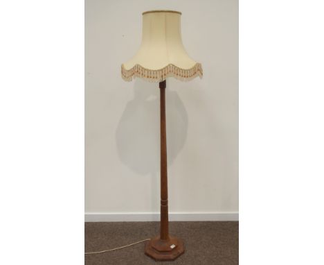'Mouseman' oak standard lamp, adzed octagonal column on stepped octagonal base, by Robert Thompson of Kilburn, with shade, H1