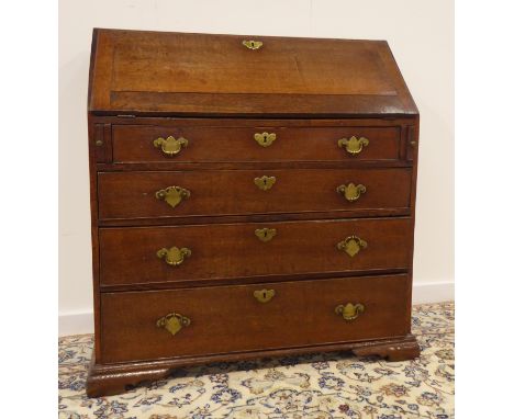 18th century oak bureau, fall front enclosing fitted interior, four long graduating drawers, ogee bracket feet, W93cm, H101cm