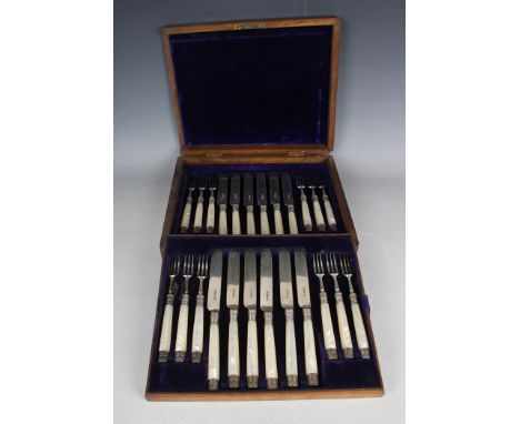 A set of twelve late Victorian silver and mother-of-pearl handled fruit knives and forks, Sheffield 1897 by Harrison Brothers