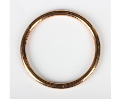 A 9ct gold circular bangle, Chester 1923, weight 10.2g, inside diameter 7.2cm.Buyer’s Premium 29.4% (including VAT @ 20%) of 