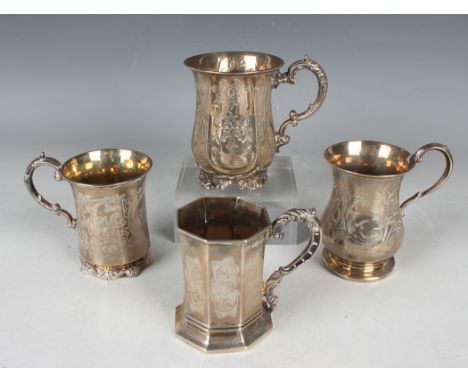 An early Victorian silver christening tankard of tapering cylindrical form, engraved with panels of flowers, flanked by a scr