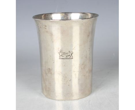A late 18th century Continental silver beaker of slightly tapered cylindrical form, the front engraved with a lion and bull c