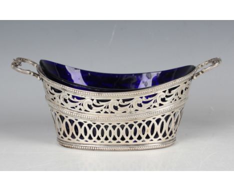 A late 19th century silver oval two-handled sugar bowl with pierced and beaded sides, flanked by scroll handles, import mark 