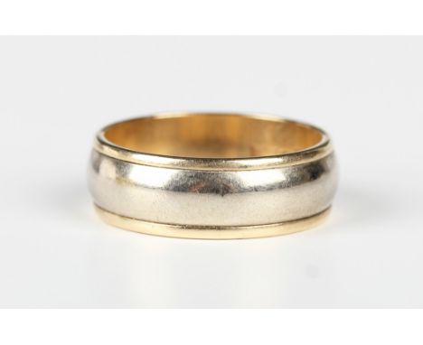 A 9ct two colour gold wide band wedding ring, London 2000, weight 5.8g, ring size approx R1/2.Buyer’s Premium 29.4% (includin