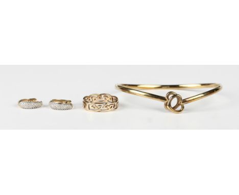 A pair of 9ct gold and diamond earrings in a curved design, length 1.3cm, a 9ct gold bangle with open heart shaped terminals 