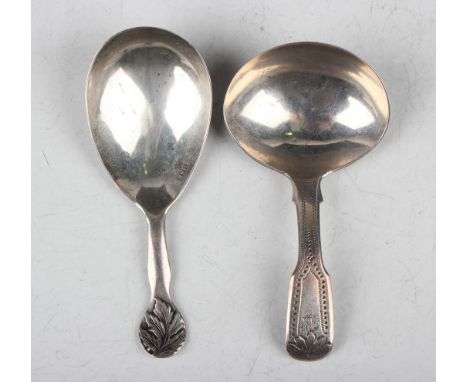 An early Victorian silver caddy spoon with oval bowl and shaped handle with cast leaf terminal, Exeter 1852 by Henry Samuel E