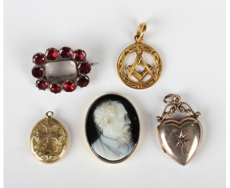 An early 19th century gold backed and flat cut garnet brooch, glazed with a central compartment, unmarked, weight 3.1g, width