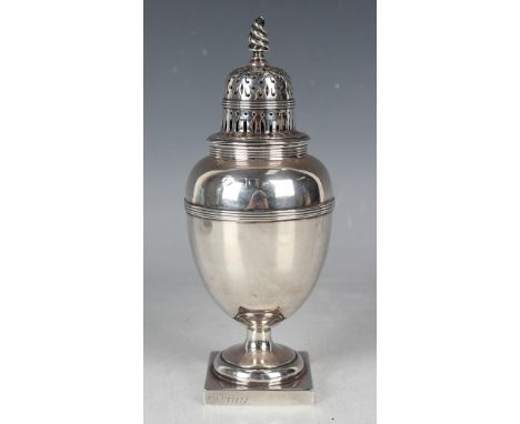 An Edwardian silver sugar caster with pierced domed lid and spiral finial above an ovoid girdled body, on a circular foot and