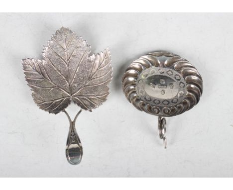 A George III silver caddy spoon, the vine leaf bowl with pierced tapering handle, Birmingham 1809 by Matthew Linwood, length 