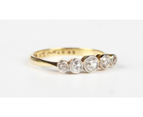 A gold, platinum and diamond five stone ring, collet set with a row of cushion cut diamonds graduating in size to the centre 