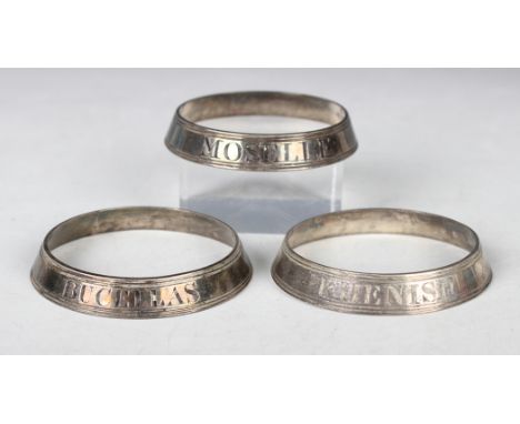 A set of three George III silver bottle collar labels, each engraved with opposing 'Moselle', 'Phenish' and 'Bucellas', betwe