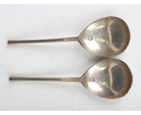 A pair of Worshipful Company of Mercers reproduction silver slip-top spoons from the Trinity Hospital set, each stem back det