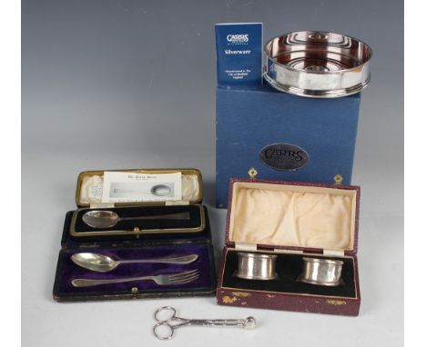 A group of silver items, comprising a christening spoon and fork, Sheffield 1907, cased, a replica of 'The Devon Spoon', Shef