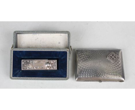 A silver rectangular engine turned cigarette case, the front applied with a marcasite set geometric square motif, length 8.2c