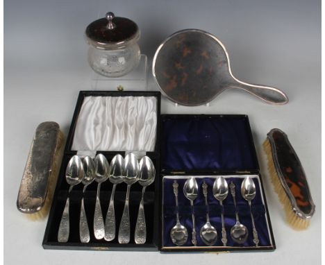 A small group of silver items, including a set of six apostle coffee spoons, Birmingham 1914 by Mappin &amp; Webb, cased, and