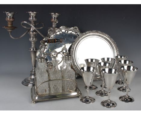 A group of plated items, including a pair of oval entrées dishes, covers and handles, various other entrées dishes, a circula