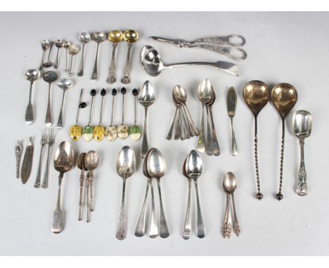 A pair of Continental .830 silver serving spoons with spiral twisted handle and ball terminals, length 20.6cm, and a group of