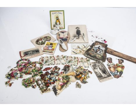 A quantity of chromolithographic scraps, Including two strips of Christmas angels, children, flowers and two black gentleman;