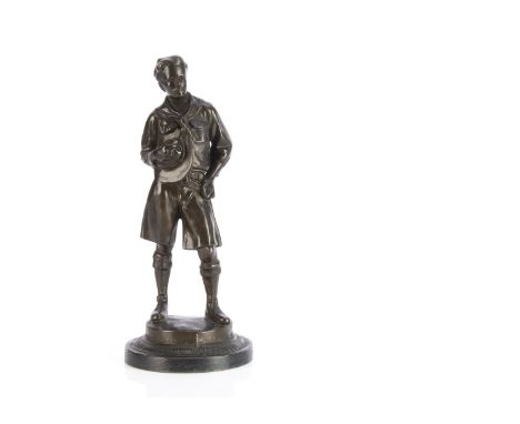 A bronzed statue The Boy Scout after Robert Tait McKenzie,  holding hat to front and clasping the head of axe --8½in. (21.5cm