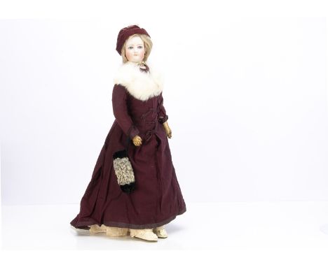 A large Francois Gaultier fashion doll No 6,  with pressed bisque socket head, bright blue striated eyes with dark  blue iris