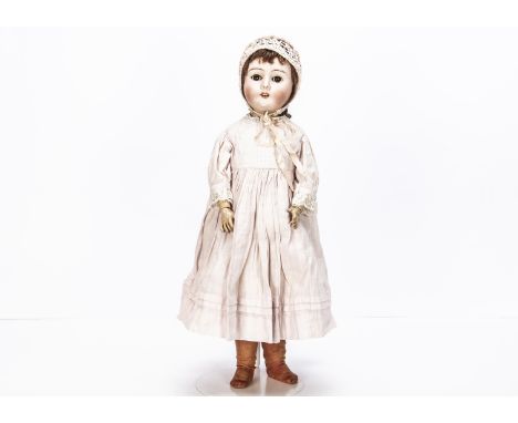 A Max Handwerck 283 child doll, with brown lashed sleeping eyes, brown mohair wig, jointed composition body, pink cotton dres