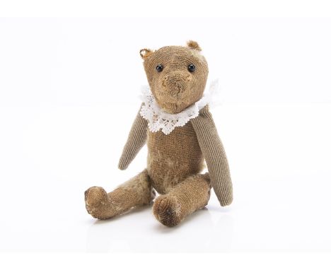 A World War One larger size Soldier teddy bear, with blonde mohair, large black headed glass pin eyes, pipe-cleaner ears, pro