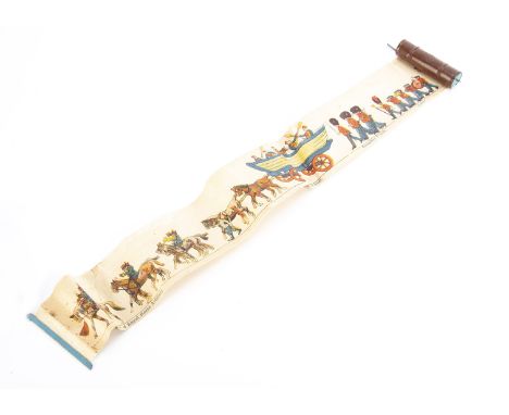 A German Penny Toy with print paper roll depicting a parade, brown painted tinplate tube with handle to roll up paper, colour