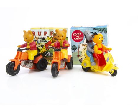 A Marx plastic friction Rupert the Bear scooter, and a similar Sooty and Sweep, in original boxes and another Rupert