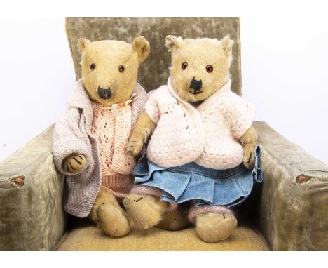 Two Chiltern type teddy bears 1930s, with golden mohair, orange and black glass eyes, black stitched nose, mouth and claws, s