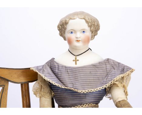 A bisque shoulder-head child doll with light brown hair, probably Alt Beck &amp;  Gottschalck with blue painted upwards glanc