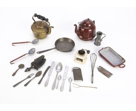 Doll's kitchen equipment, including a brass kettle --4in. (10cm.) high, a brown enamel kettle, a tinplate coffee grinder (mis