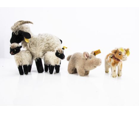 Five Steiff post-war hoofed animals,  comprising three Snucki goats, one chest tag and the other two with button and yellow f