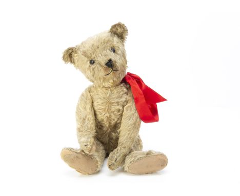 A rare early Bing teddy bear with all in one ears circa 1910,  with blonde mohair, black boot button eyes, pronounced muzzle,