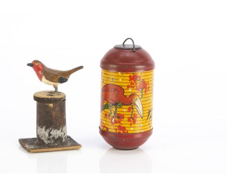A German tinplate sweet container Chinese lantern, decorated with blossom and exotic bird —4in. (10cm.) high; and a Christmas