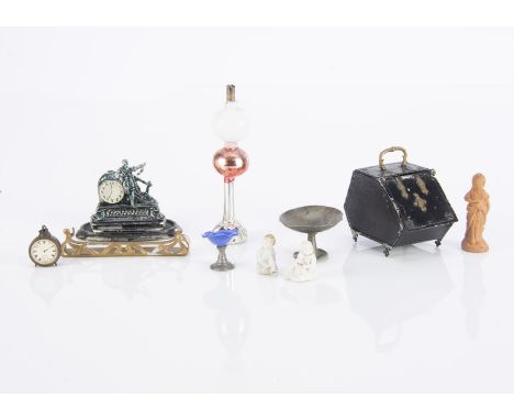 Dolls’ house chattels, a cast-metal mantel clock with figure (missing dome), a soft-metal coal scuttle and Art Nouveau fender