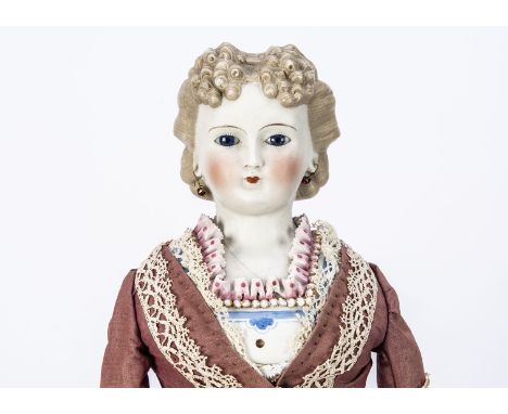 A Kling glass-eyed bisque shoulder head doll with elaborate moulded collar, with dark blue striated eyes, closed mouth, light