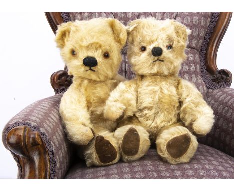 Two similar post-war small Chad Valley teddy bears,  one with light golden mohair, orange and black glass eyes, black stitche