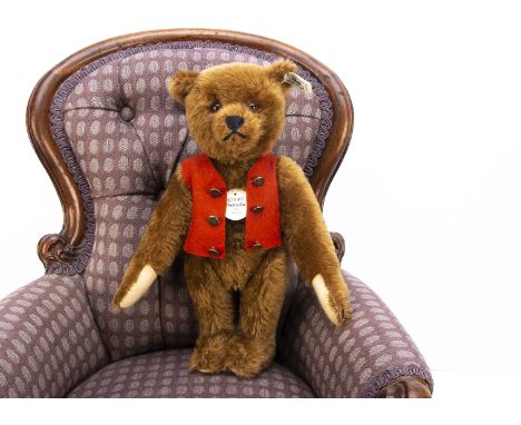 A Steiff Teddy Bu 1925 Replica,  716 of 4000 with certificate and original bag  (dusty)