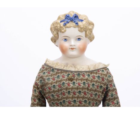 A large German bisque shoulder head doll,  probably Kling, with blue painted upward glancing eyes with white dot highlight, r